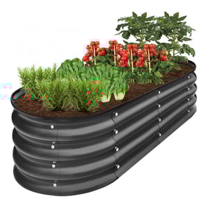 A raised garden bed with a black, corrugated metal design, showcasing planted herbs and vegetables, including rosemary, lettuce, and cherry tomatoes.