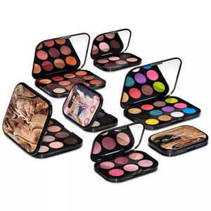 Various MAC Cosmetics eyeshadow palettes are displayed, showcasing a range of vibrant and neutral colors in both large and small sizes.