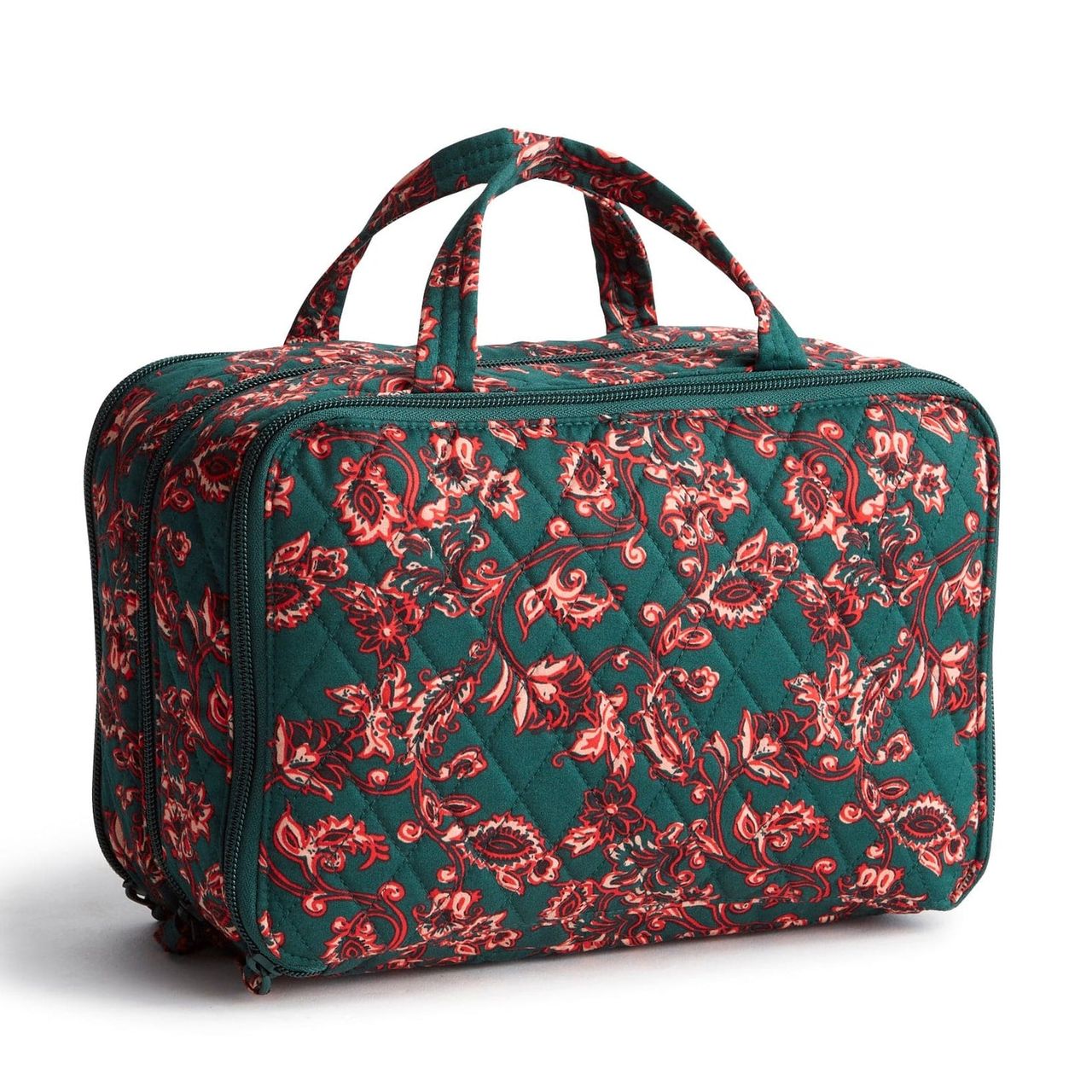 Vera Bradley's Ultimate Travel Case is a quilted, rectangular bag with dual handles, featuring a vibrant floral pattern in red and green hues. It's designed for organized travel, offering multiple compartments for toiletries or cosmetics.