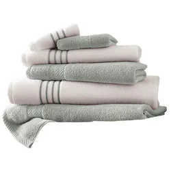 A stack of neatly arranged, color-coordinated towels and washcloths in grey and light pink shades, featuring decorative striped and textured bands.