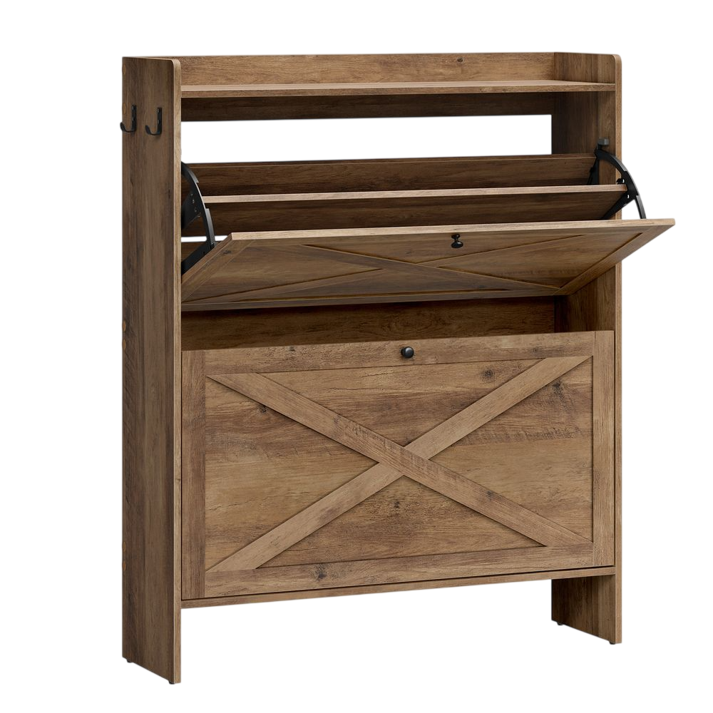 A wooden, rustic-style shoe cabinet with a drop-down door and a crisscross pattern. It features an upper shelf and double hooks on the side for additional storage or hanging.