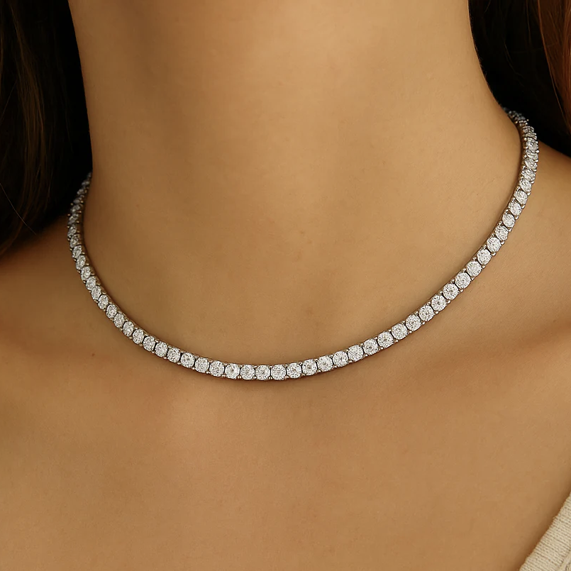 A classic tennis necklace featuring a continuous line of round white gems, suggesting a timeless and elegant design.