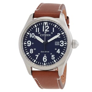 Citizen Men's Eco-Drive watch features a blue dial with bold white numerals, date display at 3 o'clock, silver-tone hands, and a stainless steel case. It has a brown leather strap with white stitching.