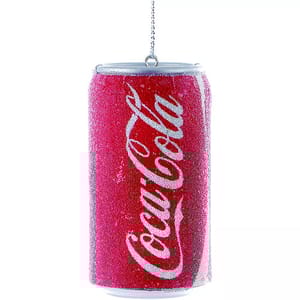 A decorative ornament resembling a red Coca-Cola can, featuring a reflective, glittery texture and a hanging chain at the top.