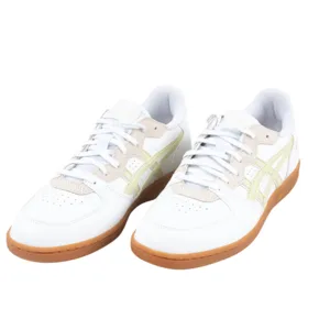Pair of white athletic shoes with beige and pale yellow accents, featuring gum soles and lace-up closure.