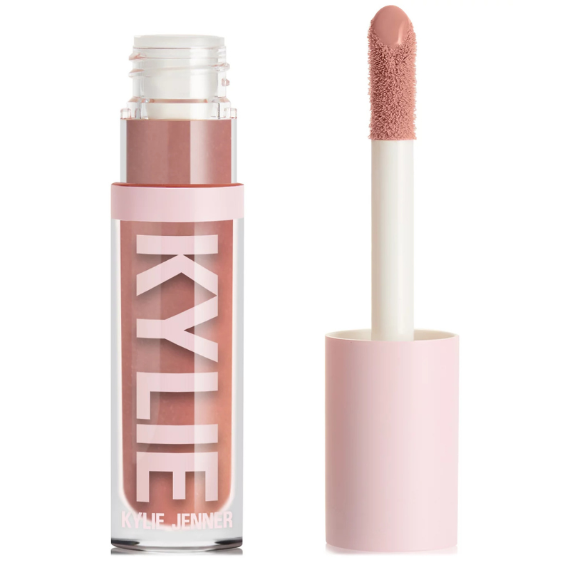 Lip gloss tube with the name \“Kylie Jenner\“ on it, featuring a light pink shade and an applicator.