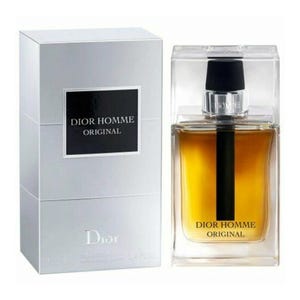Dior Homme Original Men's EDT Spray is a fragrance offered in a 3.4 FL OZ (100 ml) bottle, featuring an elegant design with a clear glass, black accents, and a silver cap. The packaging is sleek and matches the sophisticated style of the brand.