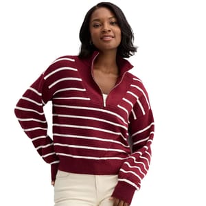 A quarter-zip sweater in a maroon color with white horizontal stripes, featuring a collar and ribbed cuffs and hem.