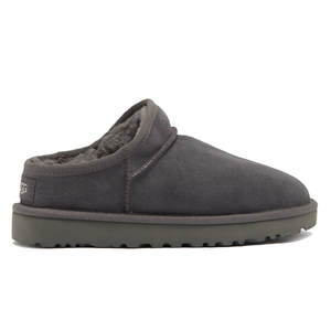A dark gray slipper with a thick sole and plush interior lining, featuring a low-cut back for easy slip-on wear.
