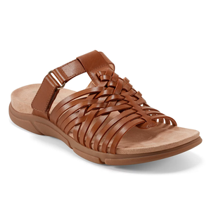 Easy Spirit Leather Cushioned Sandals feature a brown woven leather upper with a hook-and-loop strap, soft cushioned footbed, and a low-profile tan sole for comfort and casual style.