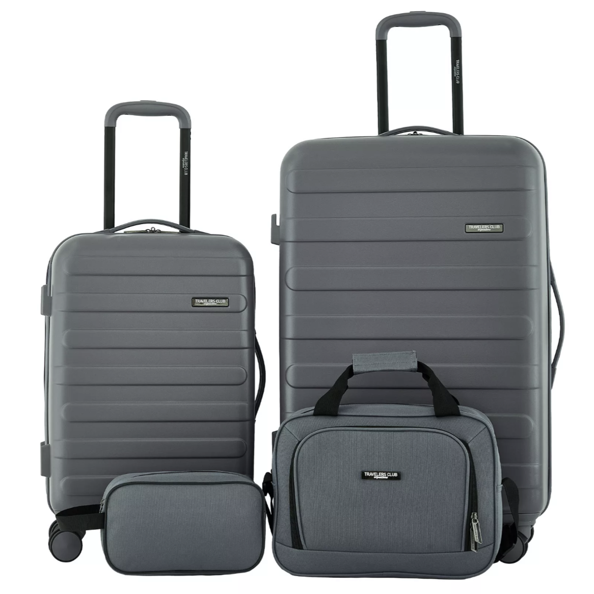 A set of grey luggage includes two rolling suitcases, a duffel bag, and a toiletry bag, all labeled \“Travelers Club.\“