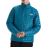 A blue, quilted jacket from The North Face with a high collar and zip closure.
