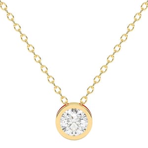 A gold chain necklace featuring a round bezel-set diamond pendant.