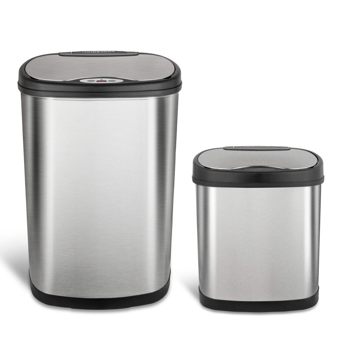 Two stainless steel trash cans with black lids, featuring a sleek, modern design. The larger bin is on the left, and the smaller bin is on the right.