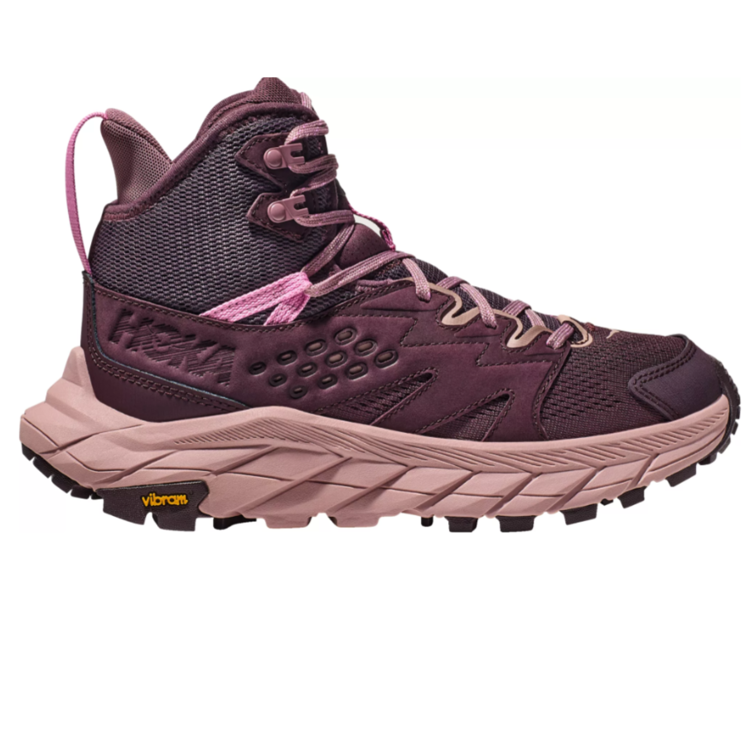 These are mid-height hiking boots featuring a maroon upper with pink laces and a beige, chunky, serrated outsole with the Vibram logo on the side.