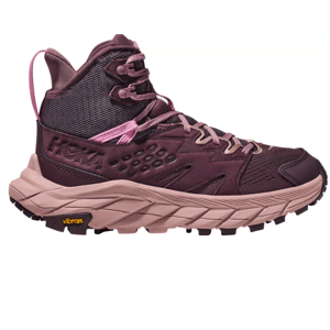 These are mid-height hiking boots featuring a maroon upper with pink laces and a beige, chunky, serrated outsole with the Vibram logo on the side.