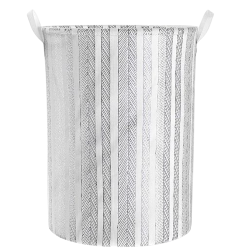 A cylindrical fabric storage basket with vertical stripes pattern and two handles.