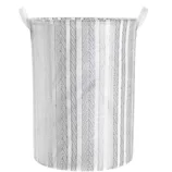 A cylindrical fabric storage basket with vertical stripes pattern and two handles.