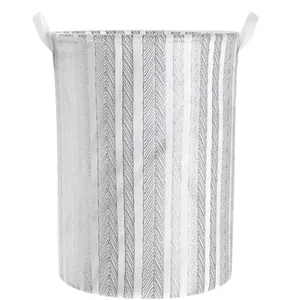 A cylindrical fabric storage basket with vertical stripes pattern and two handles.