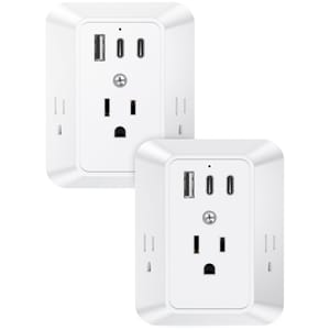 Two white wall outlets with USB and USB-C ports for charging electronic devices.