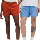 Two pairs of shorts are shown: one is red with an elastic waistband and drawstring, and the other is blue, worn by two individuals.