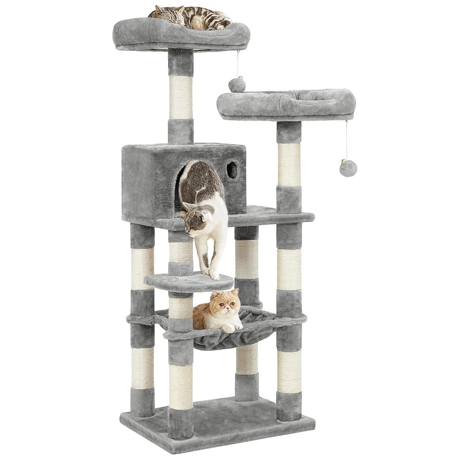 A multi-level gray cat tree featuring three playful cats, complete with a cozy condo, a hammock, multiple perches, scratching posts, and hanging toys.