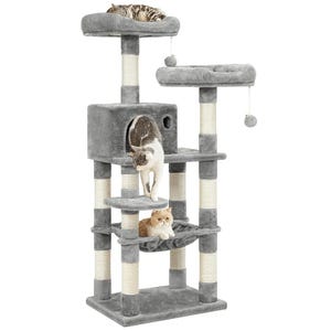 A multi-level gray cat tree featuring three playful cats, complete with a cozy condo, a hammock, multiple perches, scratching posts, and hanging toys.