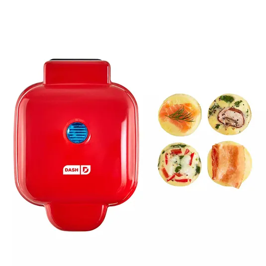 Red Dash egg bite maker with four different egg bites featuring various fillings like salmon, mushroom, and bacon.