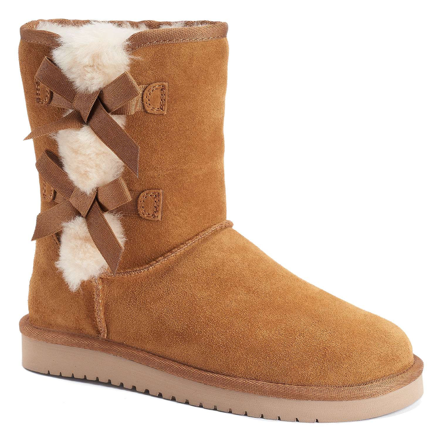 Koolaburra by UGG Short Victoria Boots feature a chestnut suede exterior, shearling lining, and decorative bows on the back with a rubber sole for traction.