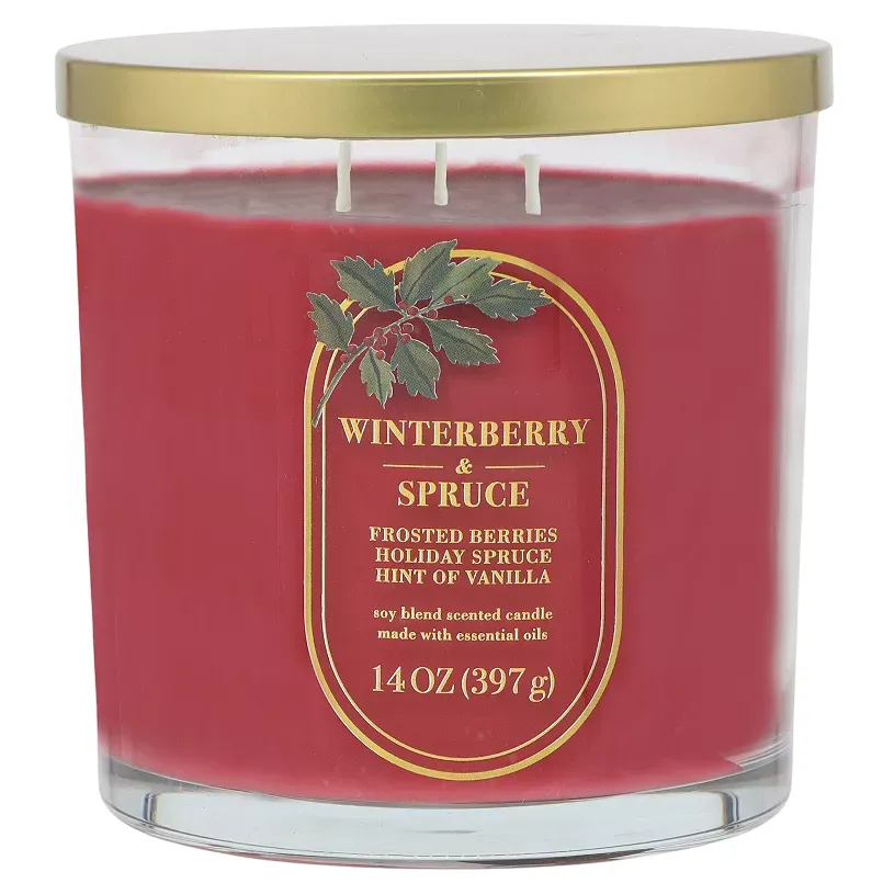 Winterberry & Spruce scented candle with notes of frosted berries, holiday spruce, and vanilla. Soy blend, 14 oz (397 g), with essential oils.