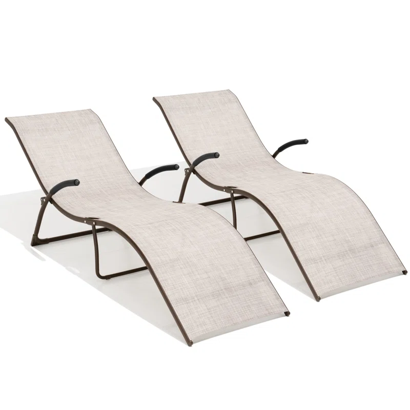 Two curved brown outdoor lounge chairs with beige fabric.
