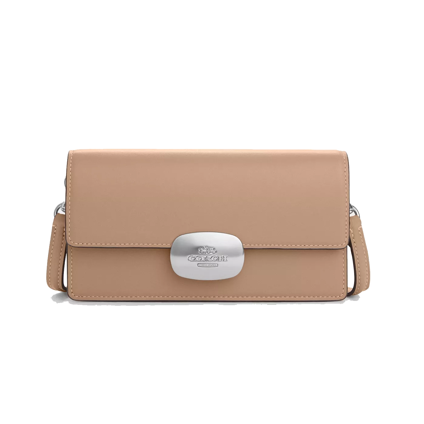 This is a Coach Outlet leather crossbody bag in a beige color with a front flap closure featuring a metallic logo plaque. The bag has a rectangular shape and an adjustable shoulder strap for crossbody or over-the-shoulder wear.