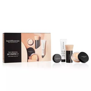 bareMinerals Get Started Kit includes foundation, primer, finishing powder, and a brush. The packaging shows the brand logo and a demonstration of the kit's contents.