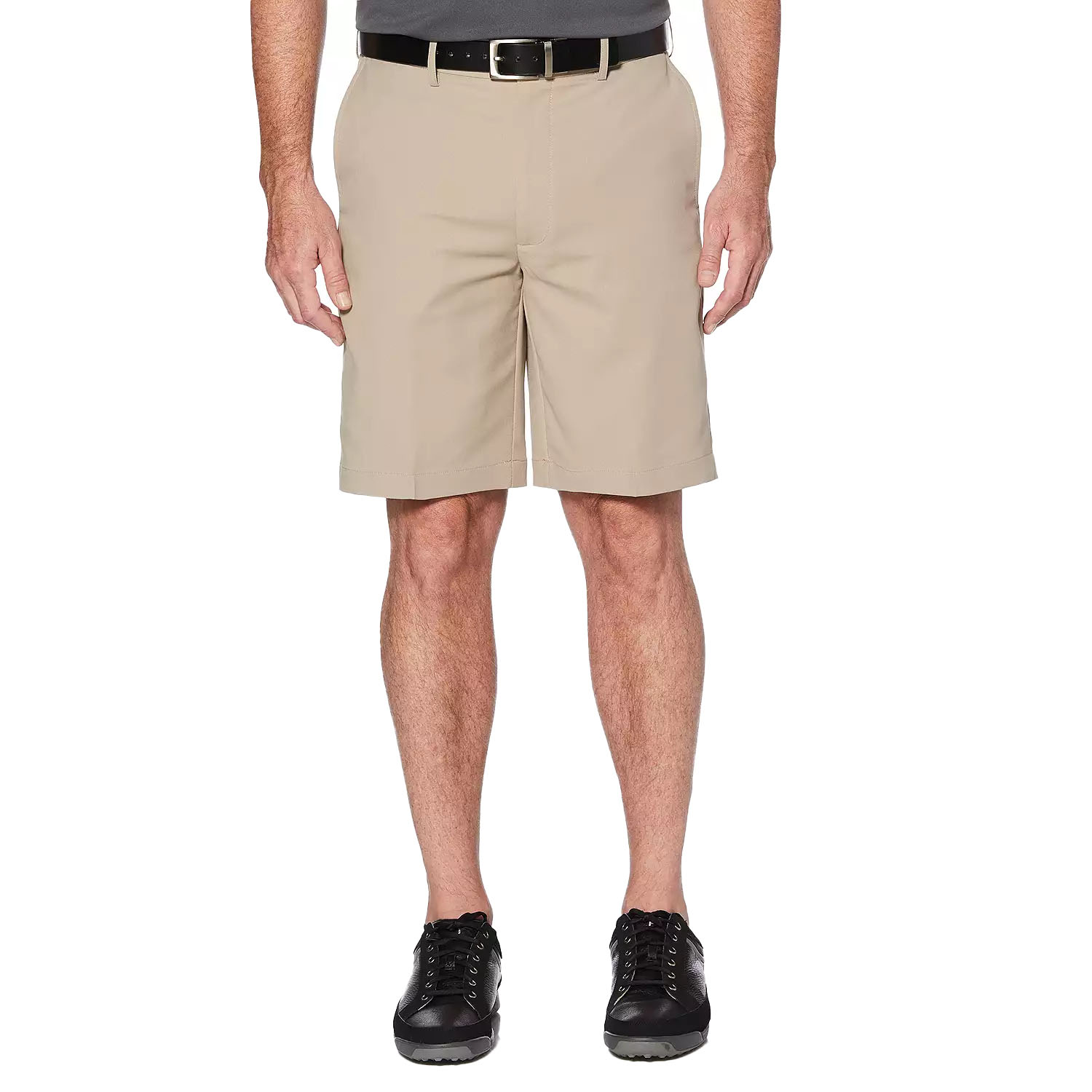 Men's khaki golf shorts featuring a straight cut, knee-length design with belt loops, front pockets, and a black belt. Paired with black laced shoes and a dark polo shirt.