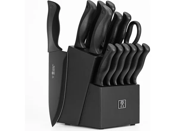 A knife block set featuring various black-handled knives, including a chef's knife, displayed in a sleek black block.