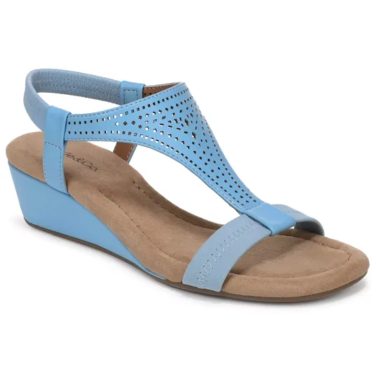 Light blue wedge sandal with perforated T-strap design, elastic heel strap, and cushioned beige footbed.