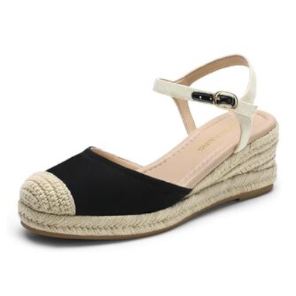 Women's wedged espadrille sandal with a black fabric upper, beige braided jute wedge, and cream ankle strap with buckle closure.
