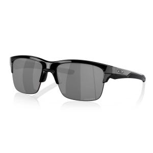 Black framed sunglasses with gray lenses and a small logo on the hinge.