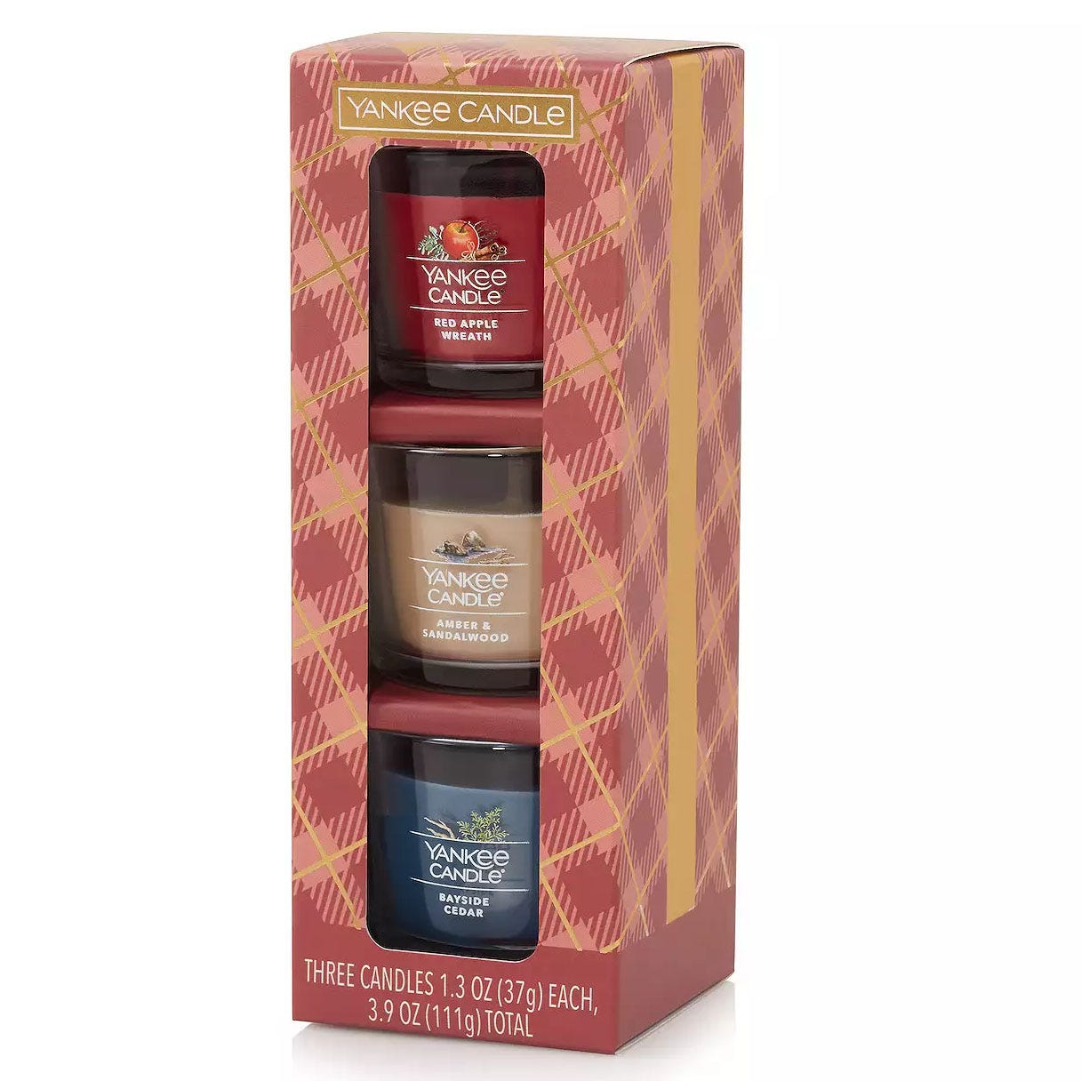 A pack of three Yankee Candle votives in different scents: Red Apple Wreath, Autumn Wreath, and Sparkling Cinnamon, each 1.3 oz. (37g).
