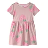 Pink short-sleeve dress with a strawberry print pattern featuring green leaves and white seeds.