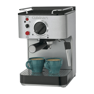 Cuisinart espresso machine with dual spouts dispensing coffee into two teal cups, featuring a control dial and indicator lights.