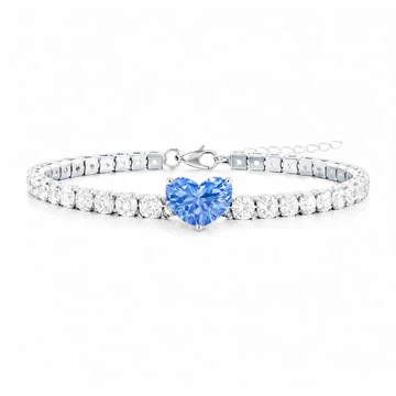 A bracelet featuring a line of clear stones and a central heart-shaped blue gemstone with a lobster clasp closure.