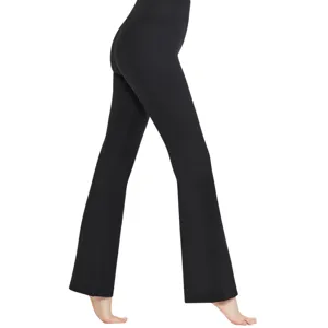 High-waisted, black flare leggings with a seamless, fitted design, suitable for casual wear or yoga.