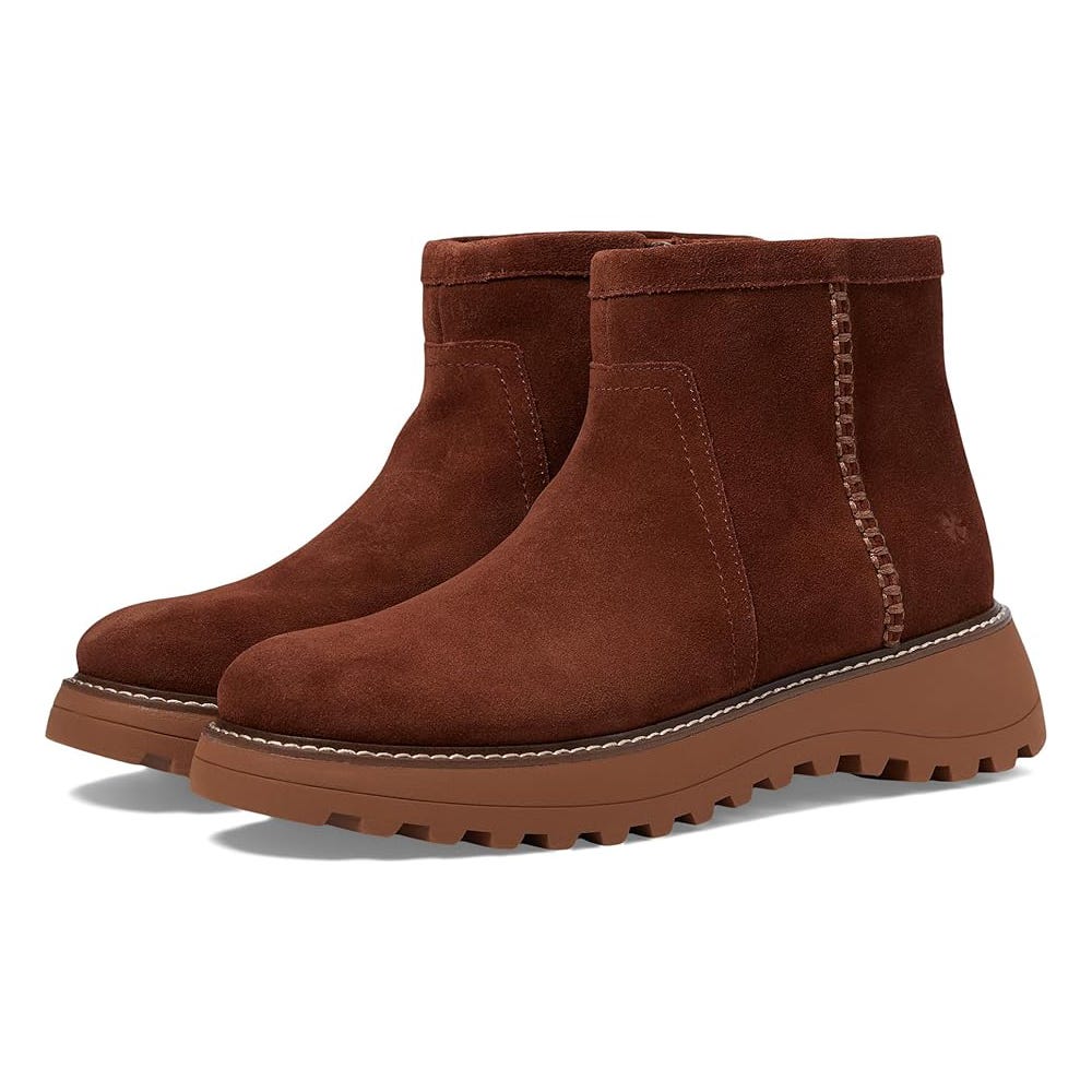 A pair of brown suede ankle boots with a chunky sole and elastic side panels.
