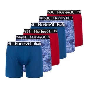 Six Hurley boxer briefs in varying colors: two in solid red, two in solid blue, and two with a blue and white tropical print, all with a black waistband featuring the Hurley logo.