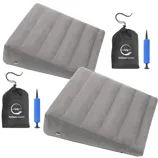 Two inflatable wedge-shaped cushions with air pumps and carrying bags, branded with \“AllSett Health.\“