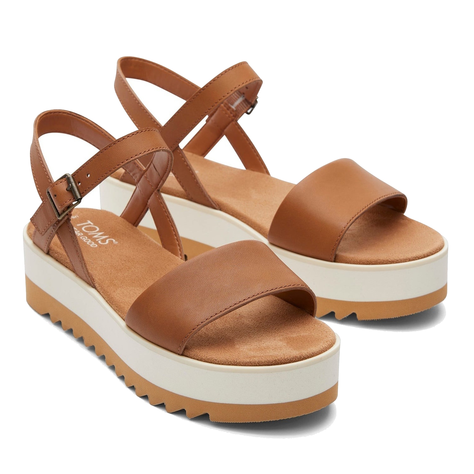 Brown platform sandals with a wide strap, adjustable ankle buckle, and white sole.