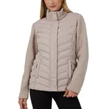 A beige quilted jacket with a high collar, featuring knit sleeves and zippered pockets, worn by a person dressed in black pants.