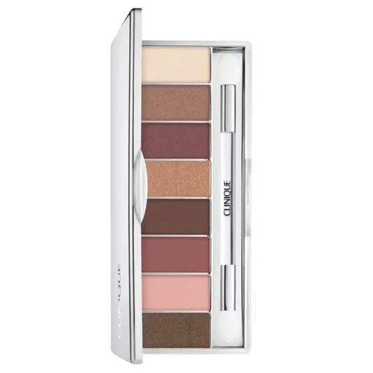 Clinique eyeshadow palette with eight shades in neutral and earthy tones, accompanied by a dual-ended applicator.