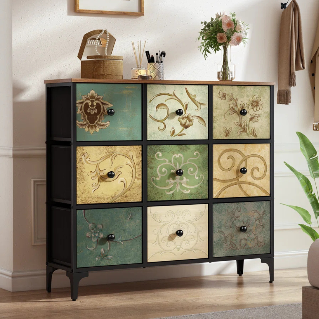 A decorative cabinet with a vintage-style design features twelve drawers, each displaying ornate floral and scroll patterns in various muted colors.